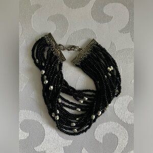 Black beads multi-strand bracelet with small grey beads, lobster claw closure